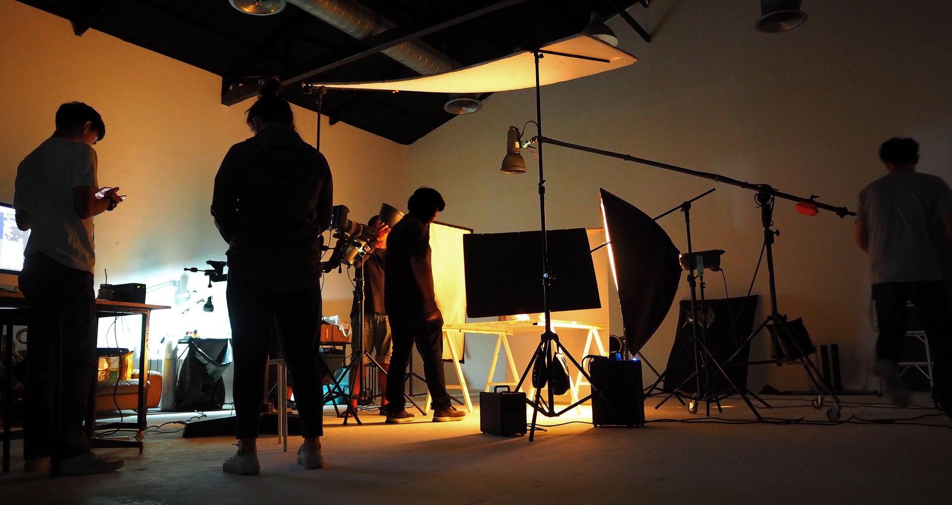 Production team shooting some video movie for tv commercial with studio equipment set.